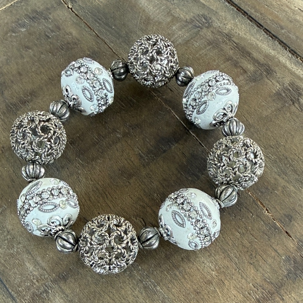 Intricate Silver and White Beaded Bracelet